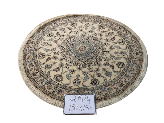 ROUND IVORY RUG